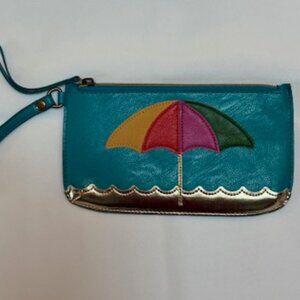Relic clutch purse with beach design.